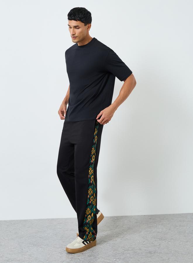 Styli Men Black Printed Side Panel Joggers - Image 1